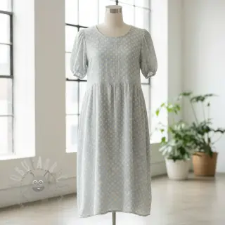Dubbelgasväv/muslin JACQUARD Dots light blue