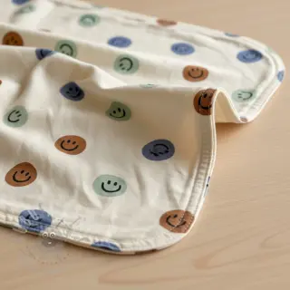 Bomullstyg FLANNEL Happy faces off white green