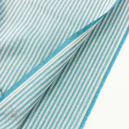 Dekorationstyg DOBBY Colored stripe turquoise