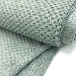 Stickat tyg Angora honey ocean green