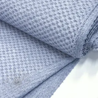 Stickat tyg Angora honey blue