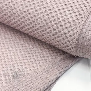 Stickat tyg Angora honey rose