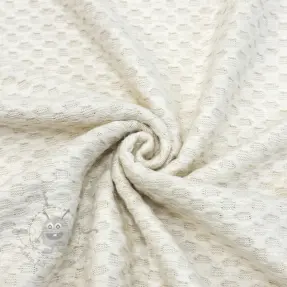 Stickat tyg Angora honey off white