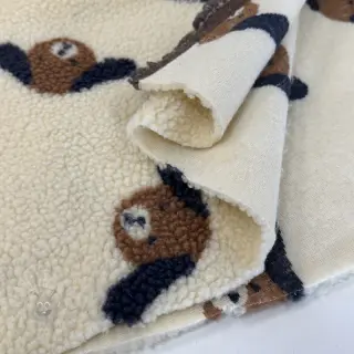 Kappmaterial TEDDY JACQUARD Dogs brown