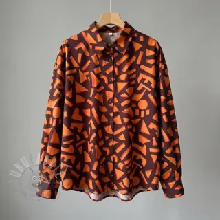 Bomullstyg SATIN Geometric dark brown