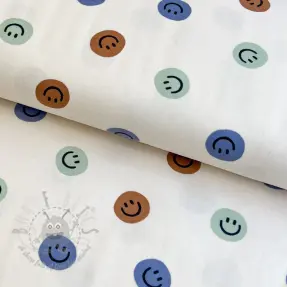 Bomullstyg FLANNEL Happy faces off white green