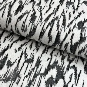 Stickat tyg jacquard Comfy Blurry Ikat grey