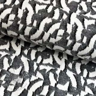 Stickat tyg jacquard Comfy Collage shapes grey