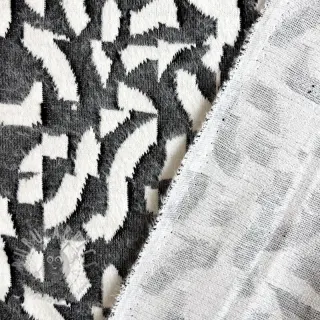 Stickat tyg jacquard Comfy Collage shapes grey