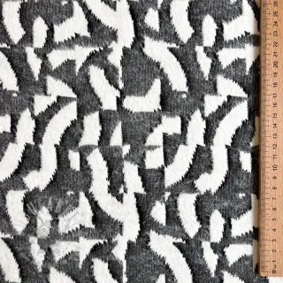 Stickat tyg jacquard Comfy Collage shapes grey